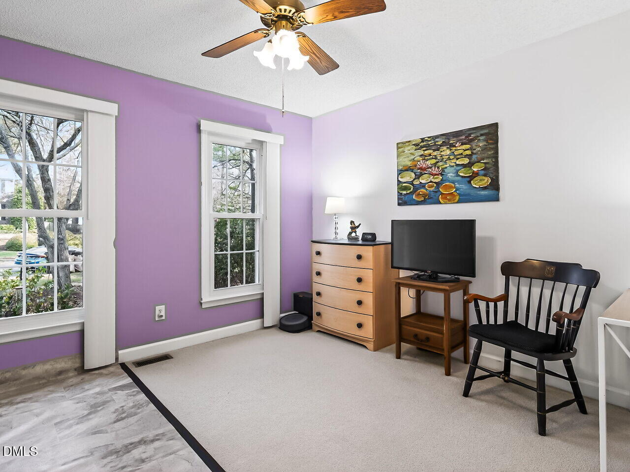 5 Flagstaff Court Durham, NC 27713 - Photo 20 of 40 a bedroom with furniture and a flat screen tv
