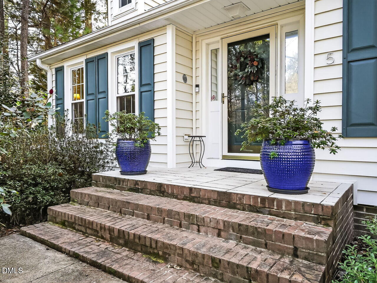 5 Flagstaff Court Durham, NC 27713 - Photo 2 of 40 a view of a house with potted plants