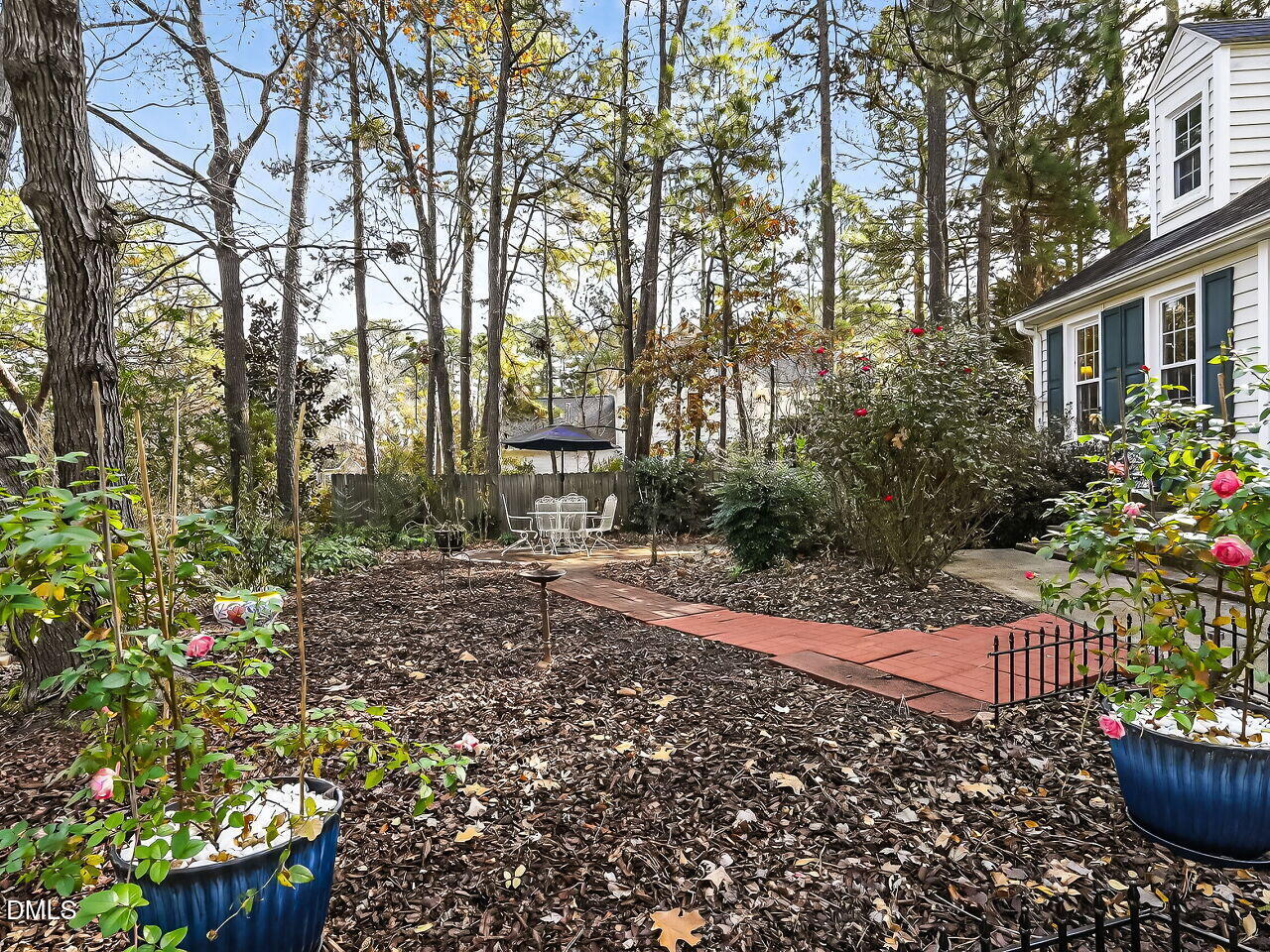 5 Flagstaff Court Durham, NC 27713 - Photo 29 of 40 a backyard of a house with lots of green space