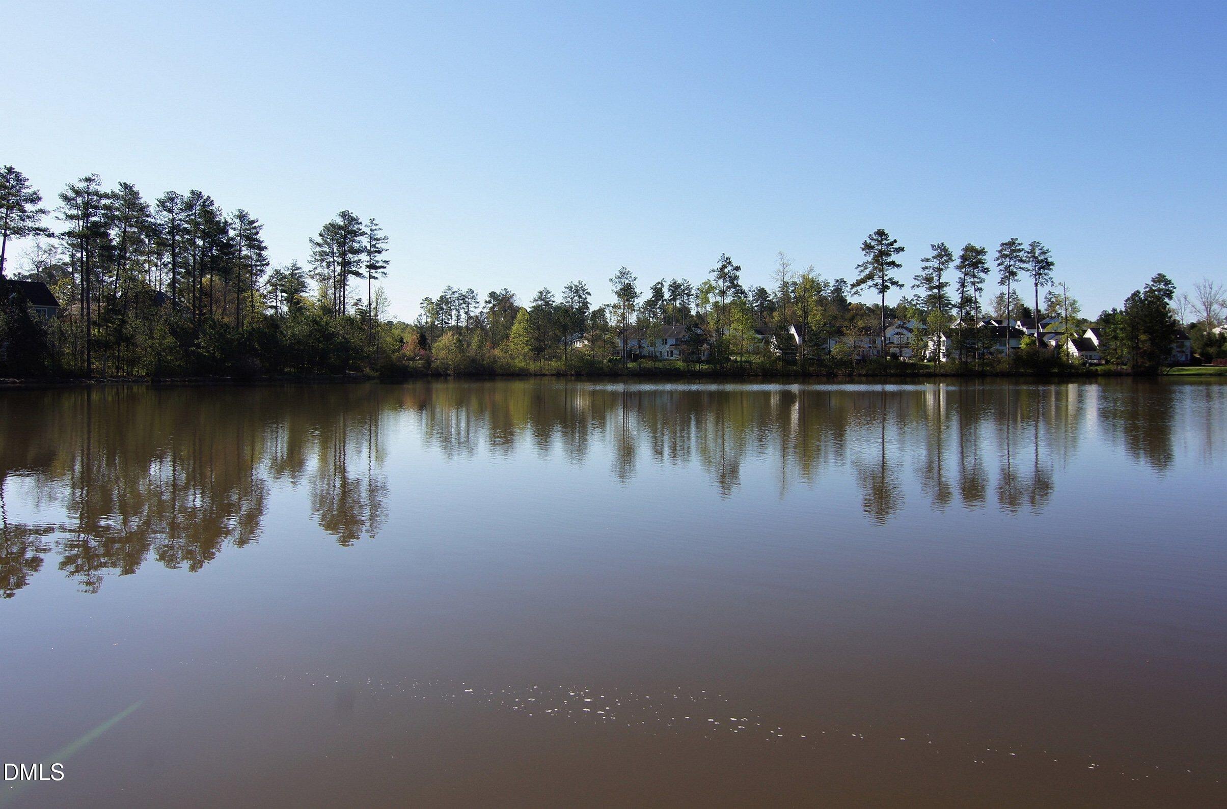 5 Flagstaff Court Durham, NC 27713 - Photo 33 of 40 a body of water with a building in the background