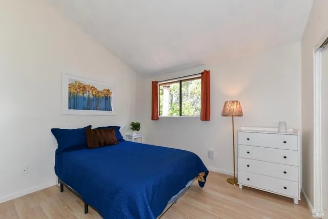 a room with a window and gym equipment