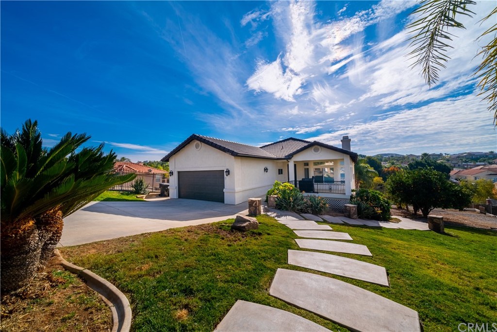 14075 Quailridge Drive Riverside, CA 92503 - Photo 1 of 1 a house view with a garden space