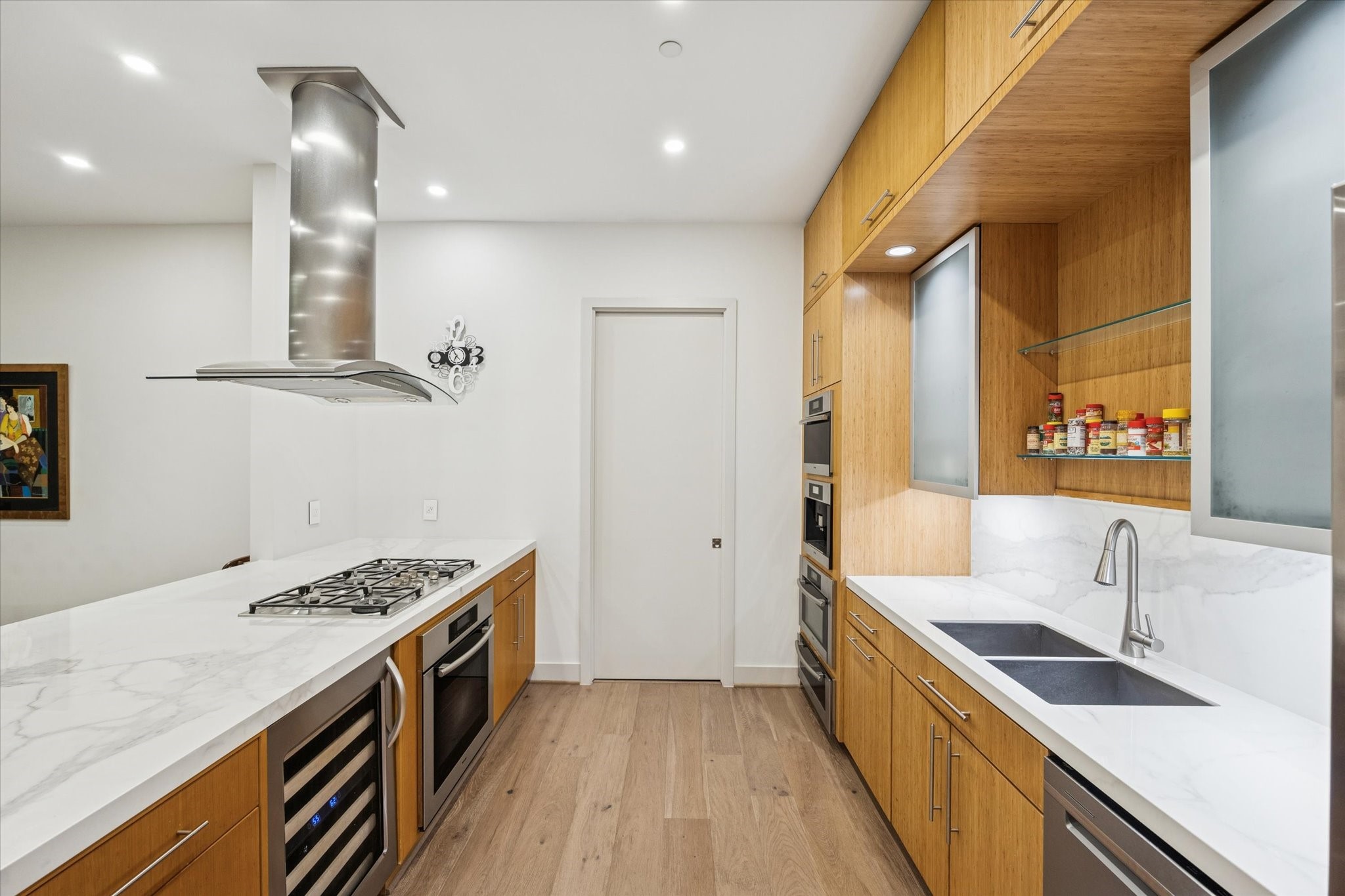 1600 Post Oak Boulevard, Unit 802 Houston, TX 77056 - Photo 3 of 19 a kitchen with stainless steel appliances granite countertop a sink stove and refrigerator