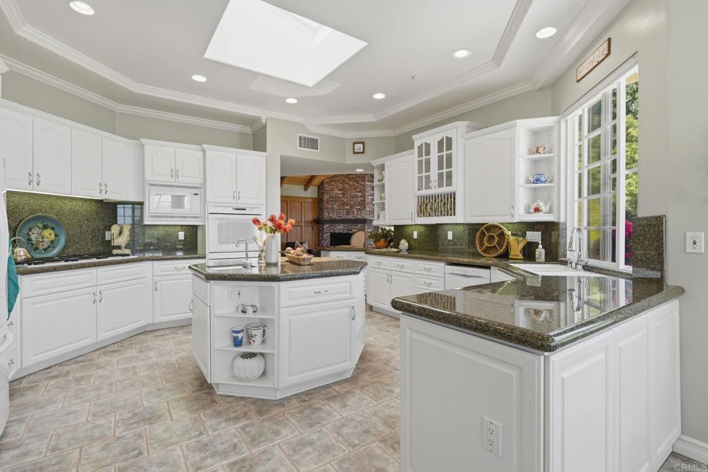 2292 Dos Lomas Fallbrook, CA 92028 - Photo 25 of 71 Well designed kitchen with large island and hand sink