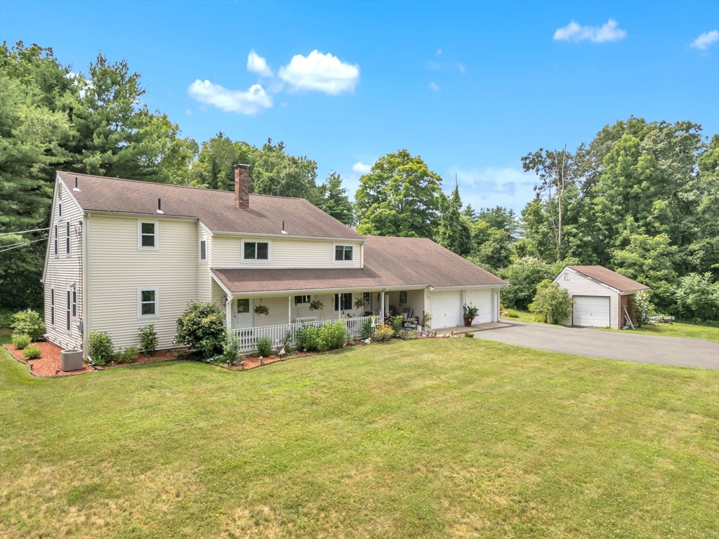 85 Maxwell Road Monson, MA 01057 - Photo 3 of 42 a view of a house with backyard and garden