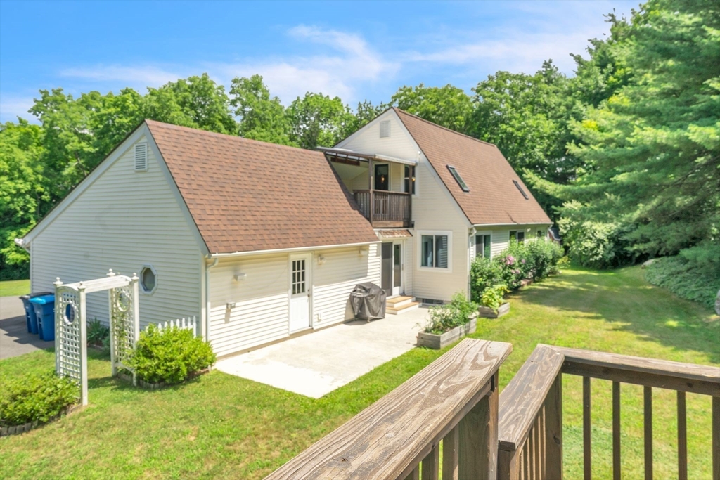 85 Maxwell Road Monson, MA 01057 - Photo 41 of 42 a aerial view of a house with yard and green space
