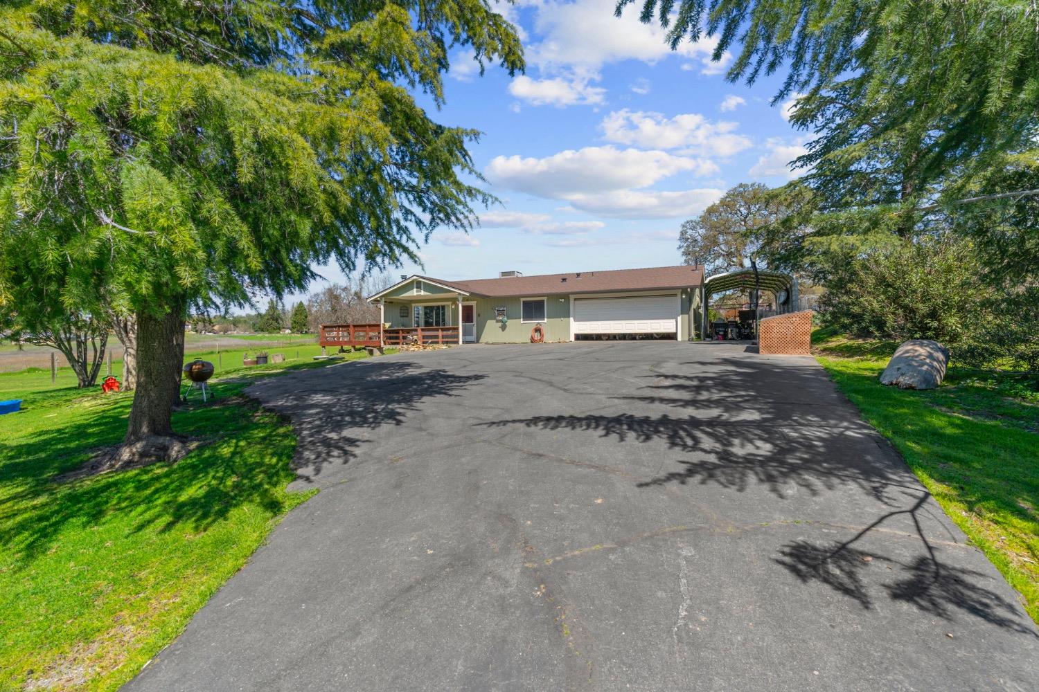 3199 Little John Road Copperopolis, CA 95228 - Photo 1 of 1 a view of a house with a yard