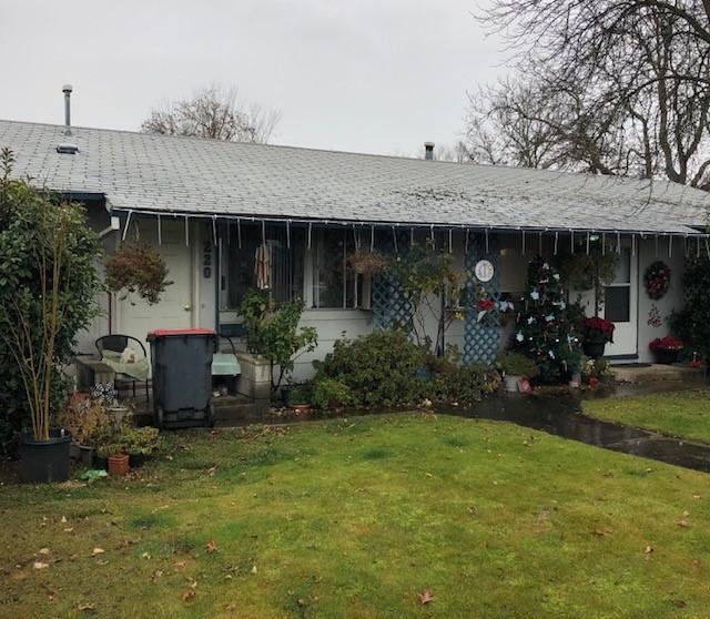 210-220 North 5th Street Central Point, OR 97502 - Photo 1 of 26 a view of a house with backyard and garden