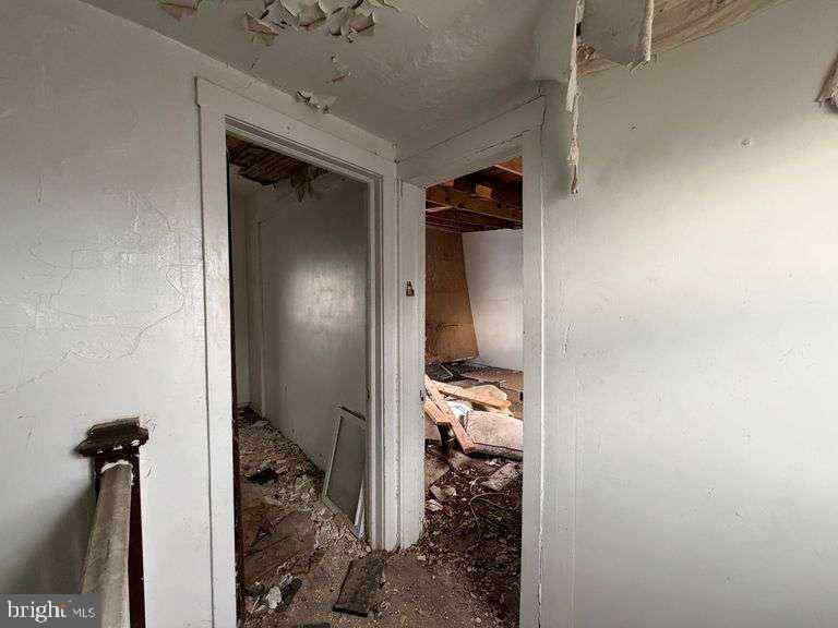 3923 Ridgewood Avenue Baltimore, MD 21215 - Photo 12 of 18 a view of a hallway with a room