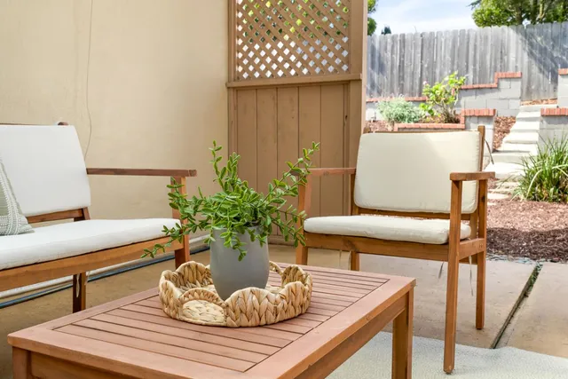 a backyard of a house with lots of green space