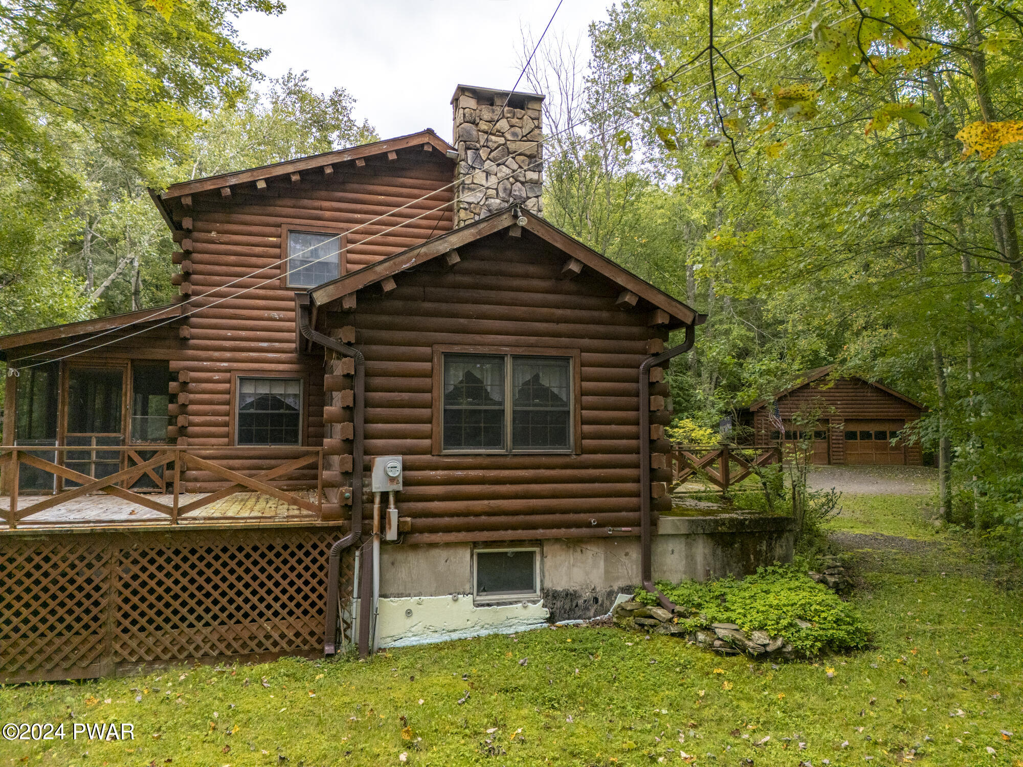 52 Wash Road Waymart, PA 18472 - Photo 66 of 90 a front view of a house with garden