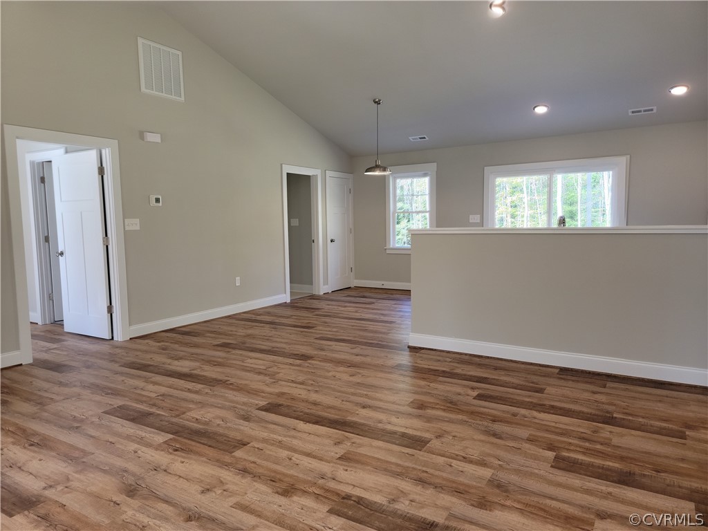 16510 Exter Mill Road Chesterfield, VA 23838 - Photo 6 of 44 an empty room with wooden floor and windows