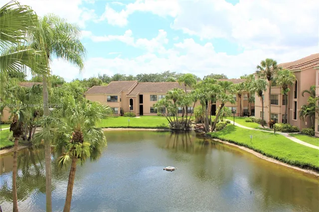 a view of a lake with a garden