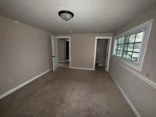 an empty room with windows