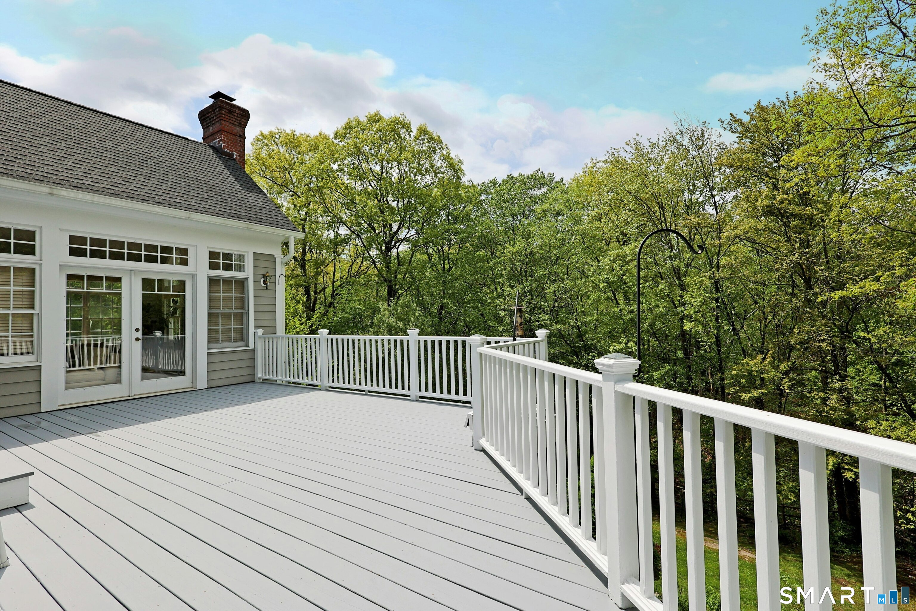 30 Whipstick Road Ridgefield, CT 06877 - Photo 8 of 40 a view of backyard with deck and outdoor seating