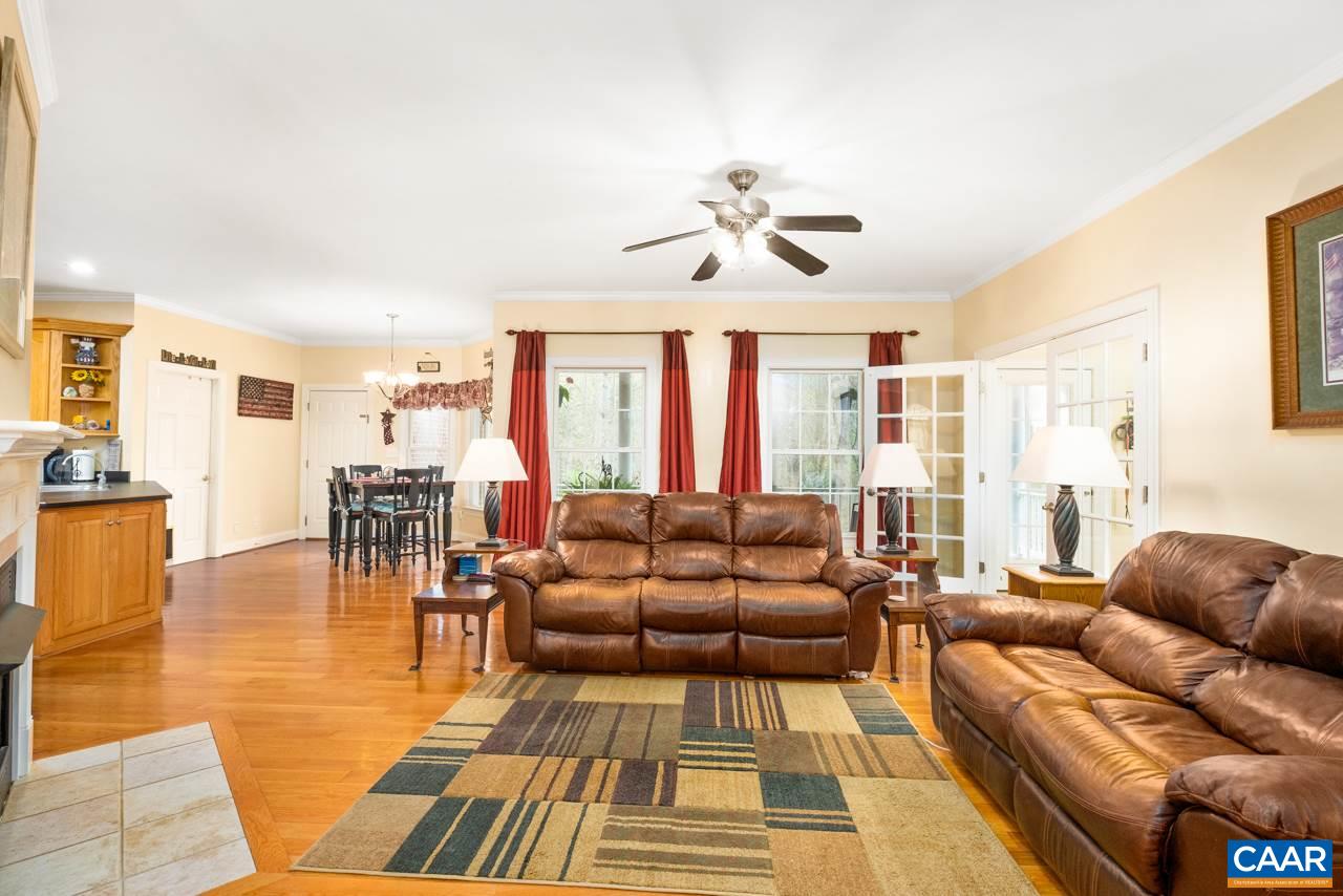 323 Buffalo Run Road Stanardsville, VA 22973 - Photo 13 of 37 a living room with furniture and wooden floor