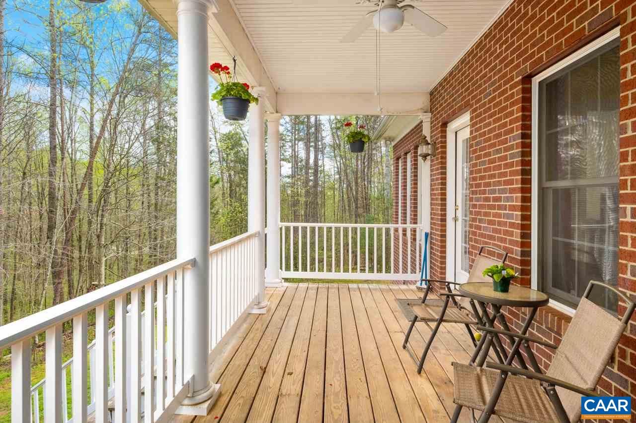 323 Buffalo Run Road Stanardsville, VA 22973 - Photo 19 of 37 a view of a balcony with wooden floor