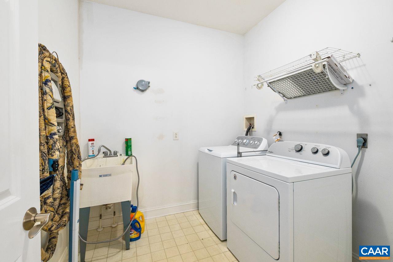 323 Buffalo Run Road Stanardsville, VA 22973 - Photo 31 of 37 a utility room with dryer and washer