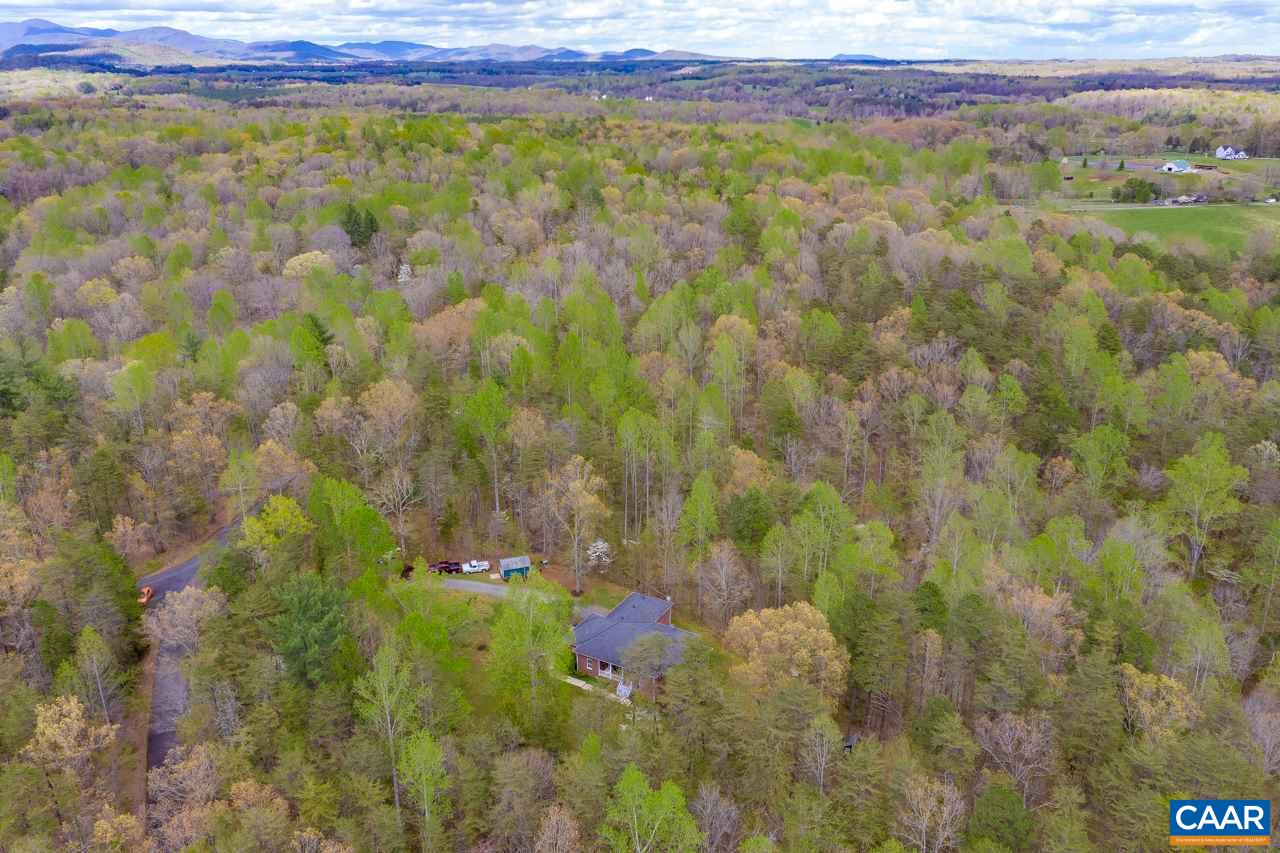 323 Buffalo Run Road Stanardsville, VA 22973 - Photo 5 of 37 a view of a lush green field
