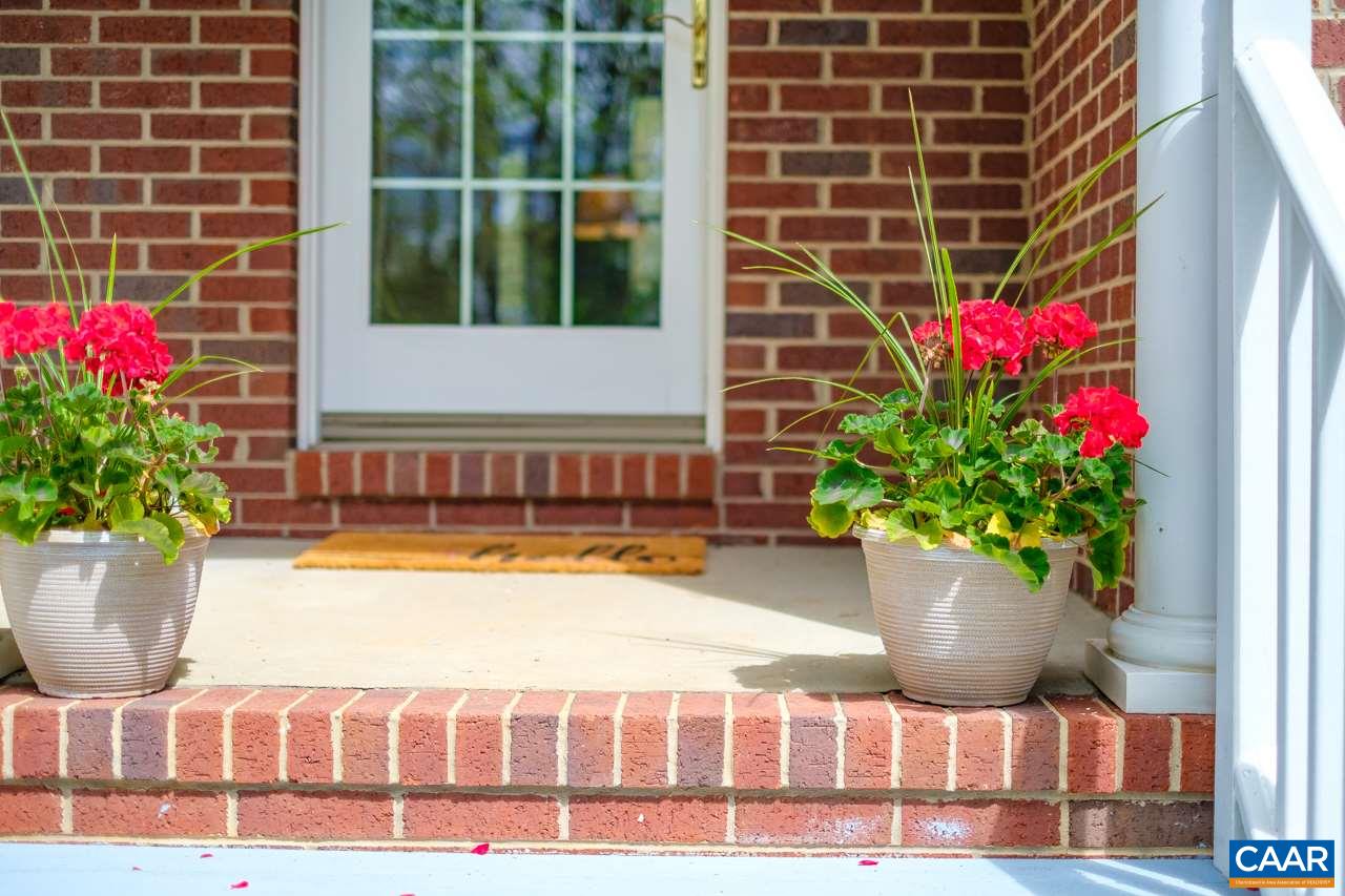 323 Buffalo Run Road Stanardsville, VA 22973 - Photo 8 of 37 a view of front door and potted plant