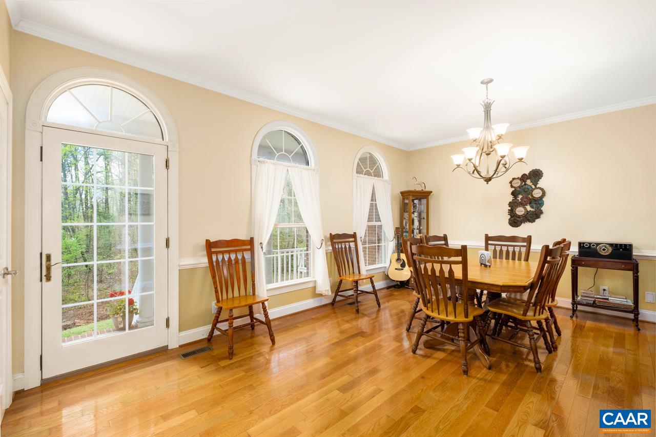 323 Buffalo Run Road Stanardsville, VA 22973 - Photo 10 of 37 a view of a dining room with furniture window and wooden floor
