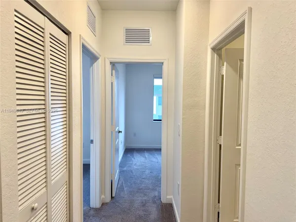 a view of a bathroom with a bathroom