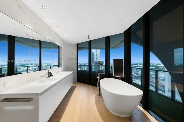 a large white room with a large window