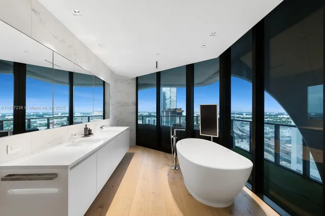 a large white room with a large window