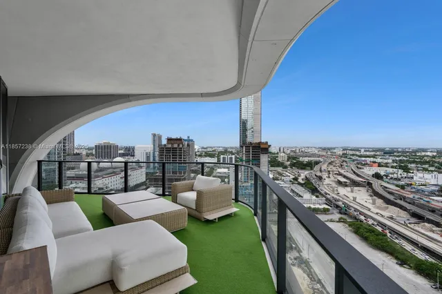 a view of a terrace with couches and a table