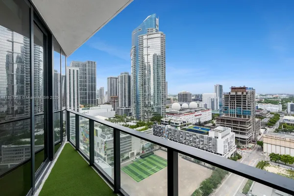 a view of a city from a balcony with city view