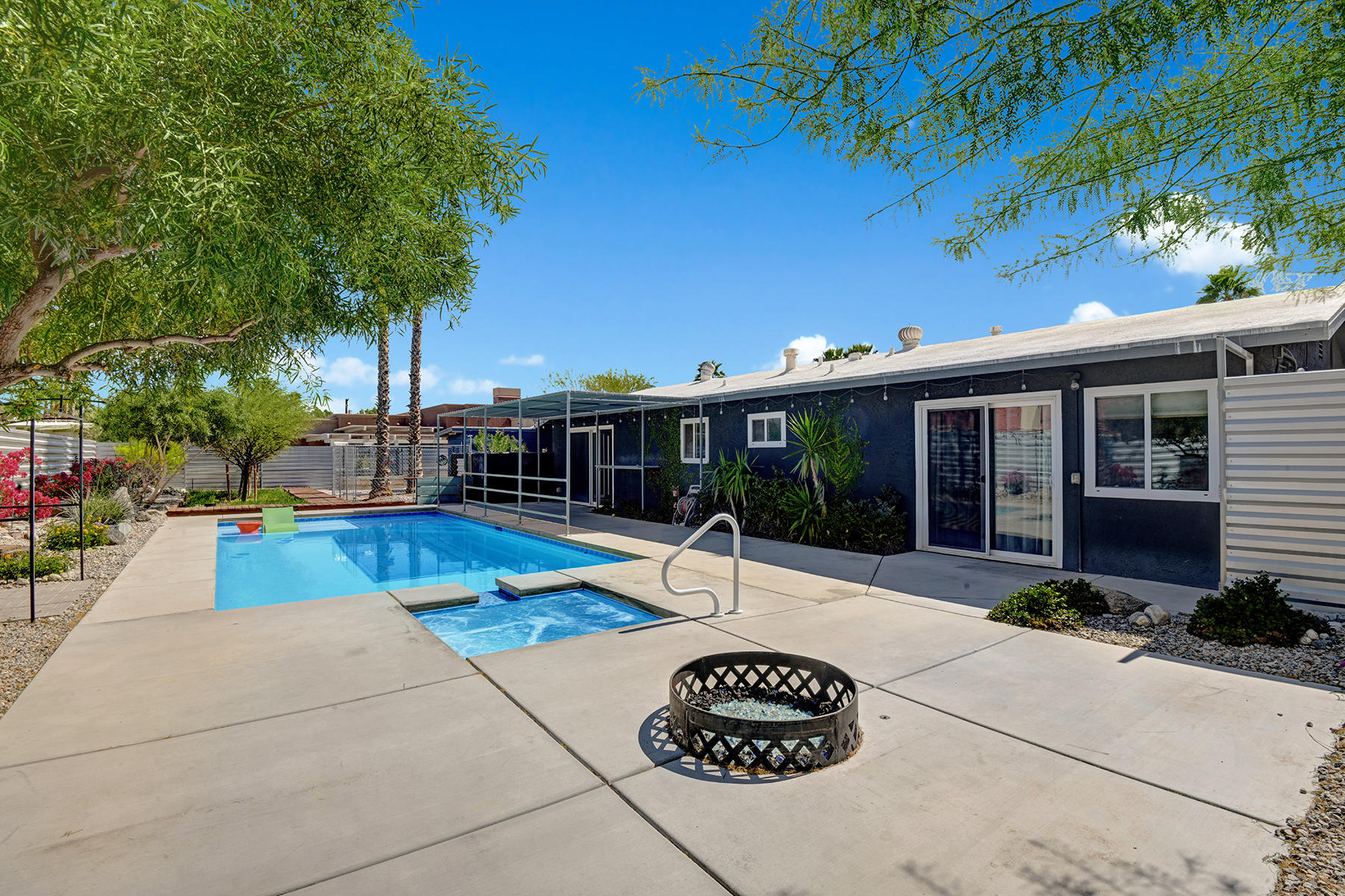 2424 East Powell Road Palm Springs, CA 92262 - Photo 7 of 23 FIRE PIT TO POOL AND BACK OF HOUSE MLS