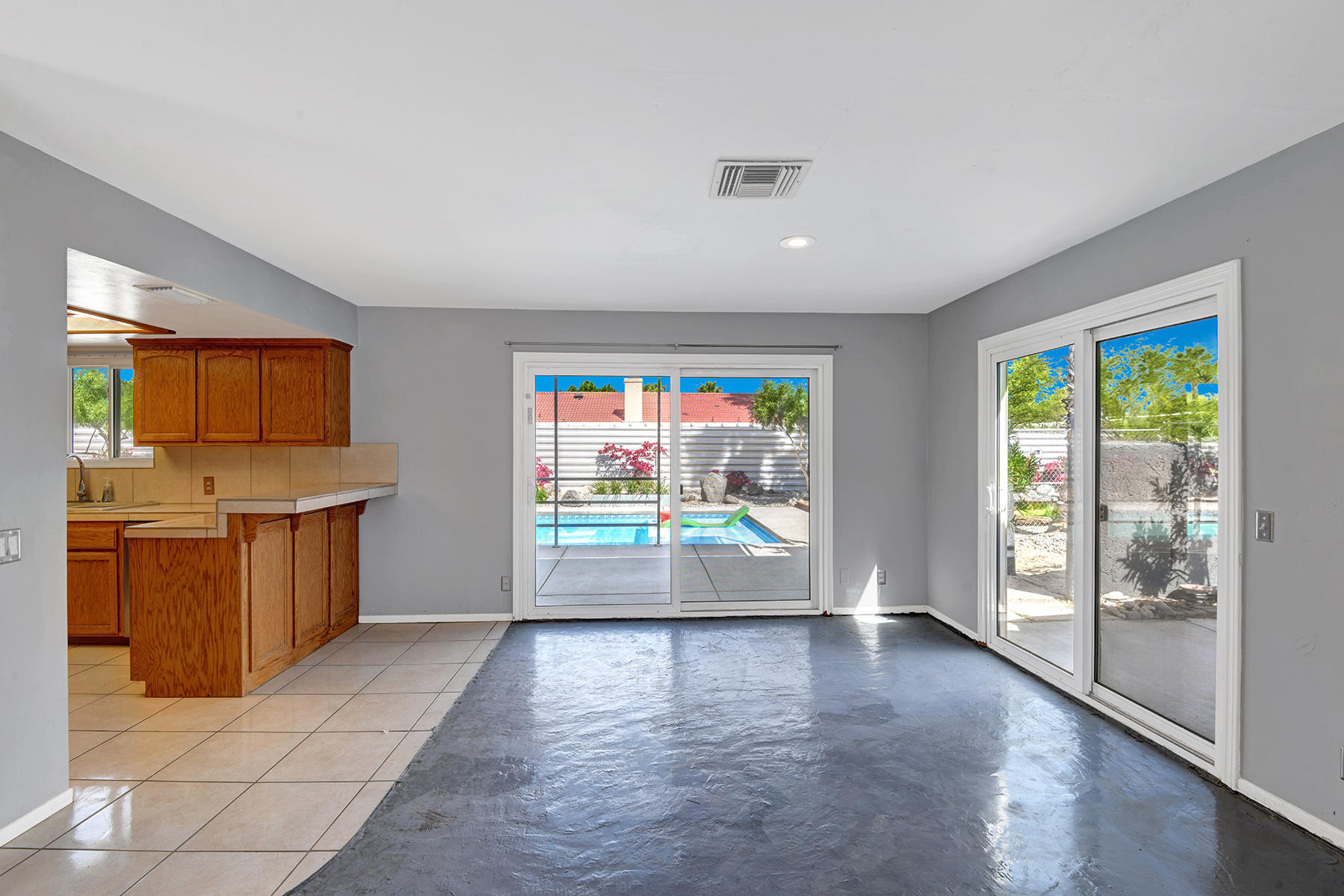 2424 East Powell Road Palm Springs, CA 92262 - Photo 9 of 23 DINING ROOM THROUGH TO POOL YARD MLS