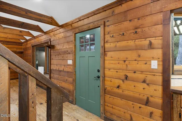 a view of livingroom with furniture and chandelier fan