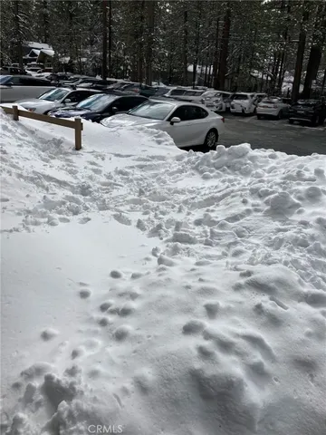 a room with gym equipment and a flat screen tv