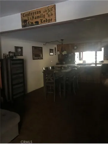 a view of kitchen and dining room