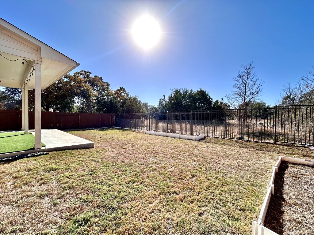 9313 Kyles Stake Road Austin, TX 78717 - Photo 38 of 40 Fenced backyard featuring a patio area