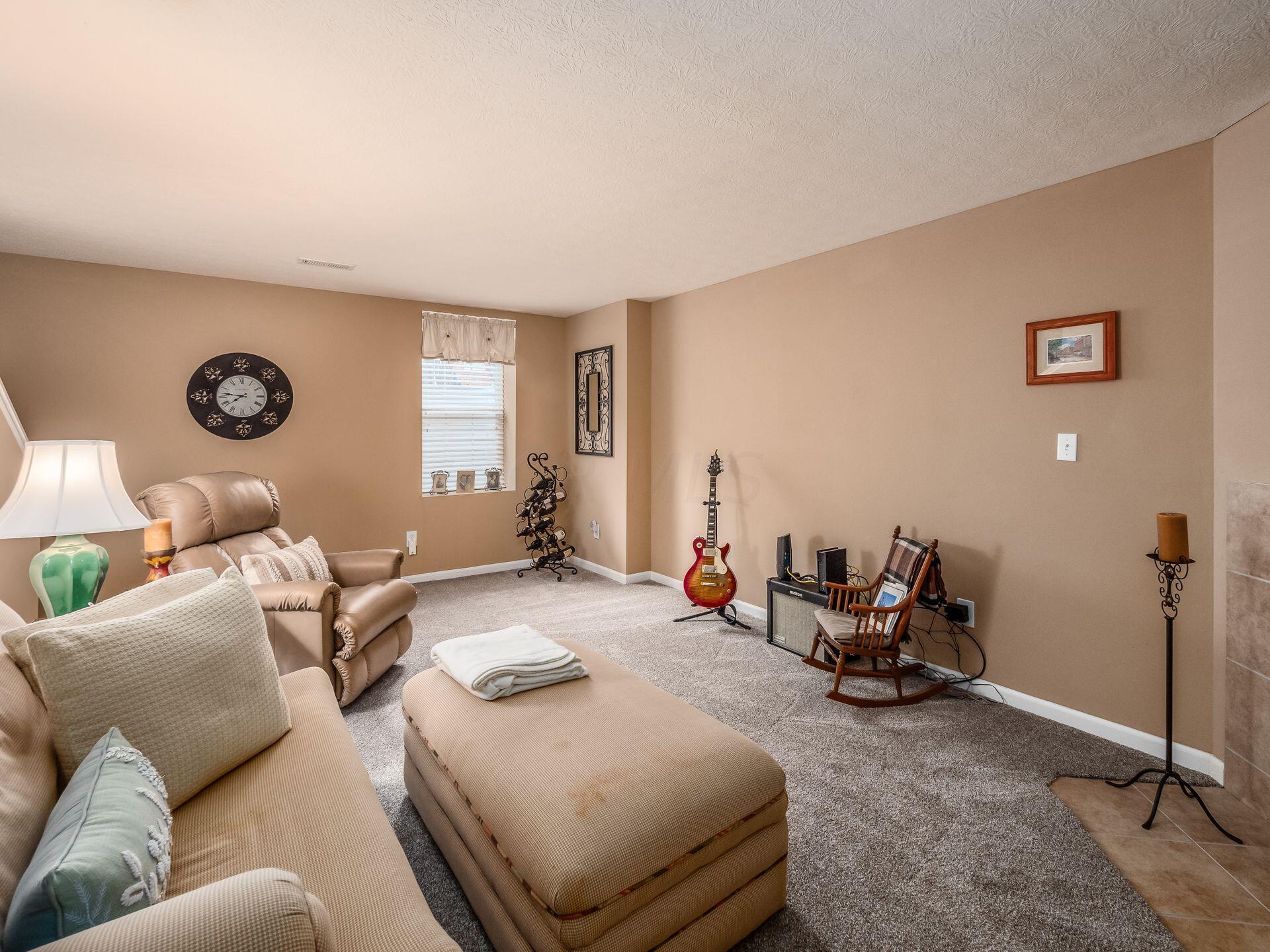 8302 Bruntsfield Road Columbus, OH 43235 - Photo 26 of 40 lower level family room/den