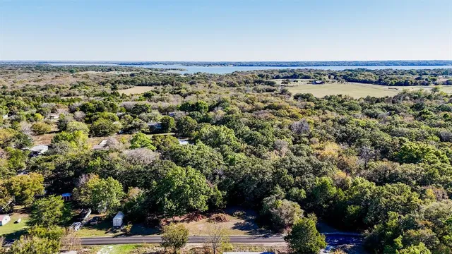 a view of a large building with a yard
