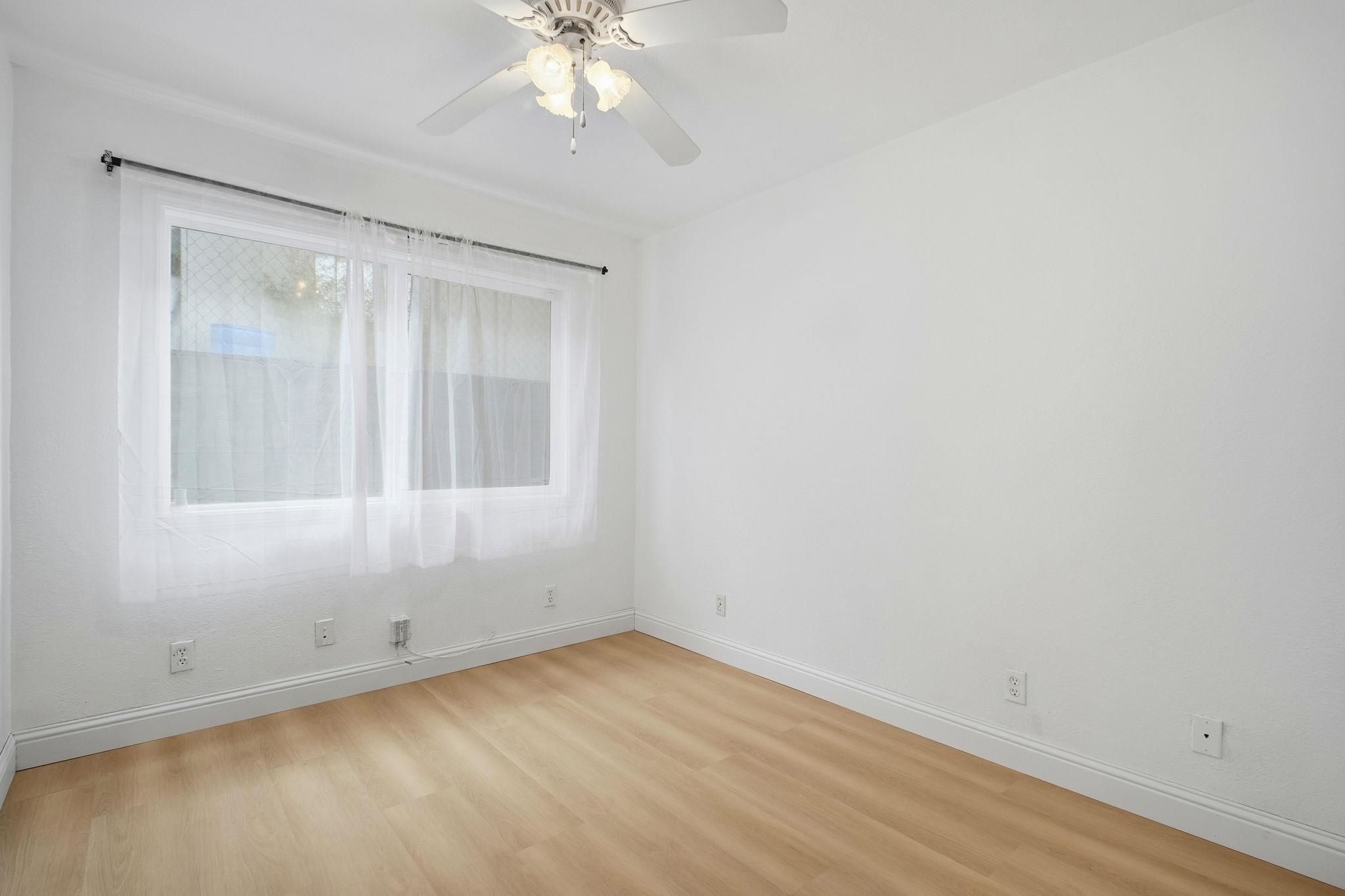 14683 Midland Road San Leandro, CA 94578 - Photo 19 of 31 a view of an empty room with a window
