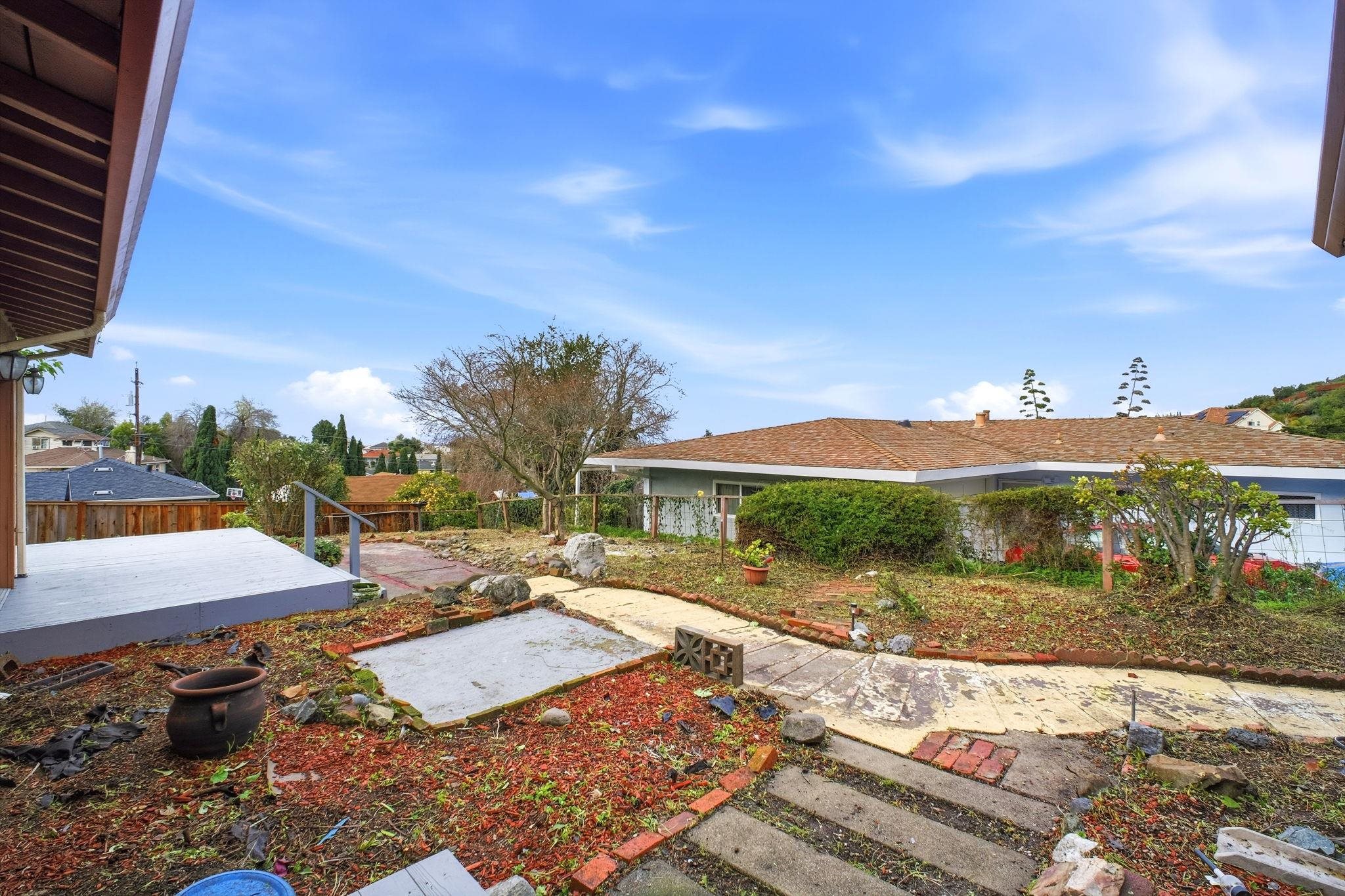 14683 Midland Road San Leandro, CA 94578 - Photo 24 of 31 a view of a house with a yard