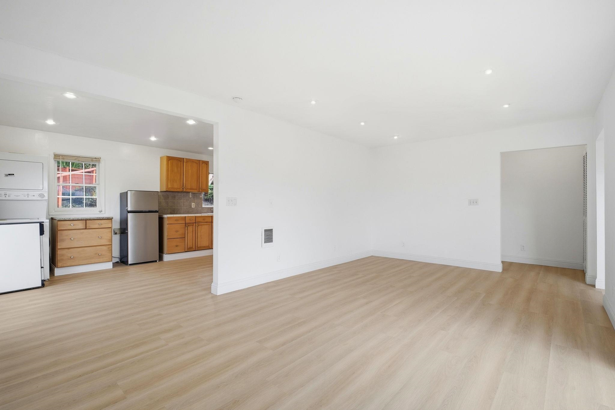14683 Midland Road San Leandro, CA 94578 - Photo 10 of 31 a view of a kitchen with a sink and a refrigerator