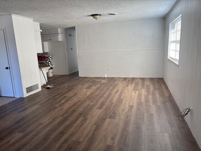 5520 18th Street Lubbock, TX 79416 - Photo 3 of 4 an empty room with wooden floor and windows
