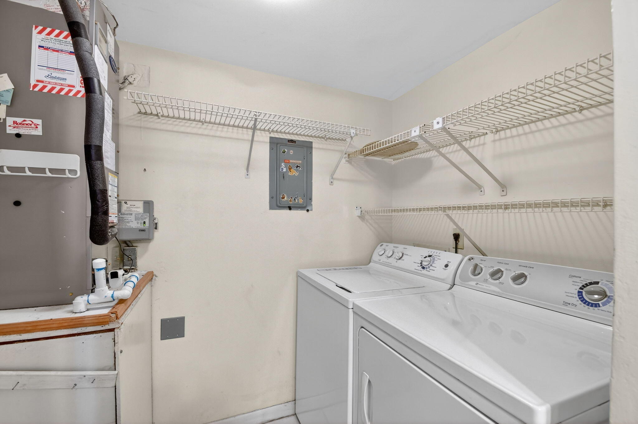 328 Pine Ridge Circle, Unit C1 Greenacres, FL 33463 - Photo 19 of 47 a utility room with dryer and washer