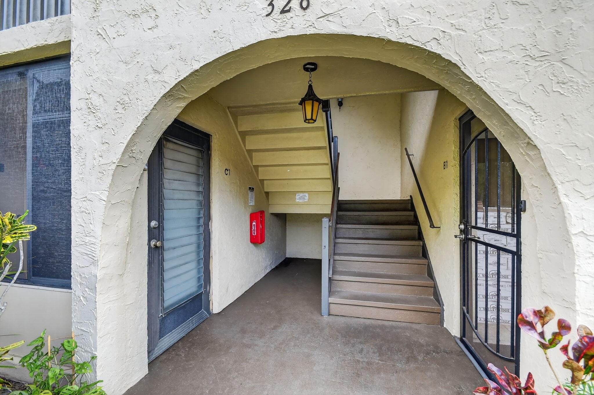 328 Pine Ridge Circle, Unit C1 Greenacres, FL 33463 - Photo 2 of 47 a view of entryway with wooden floor