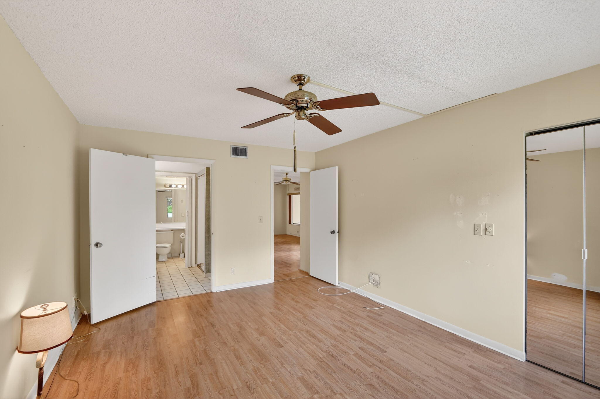 328 Pine Ridge Circle, Unit C1 Greenacres, FL 33463 - Photo 23 of 47 wooden floor in an empty room with a window