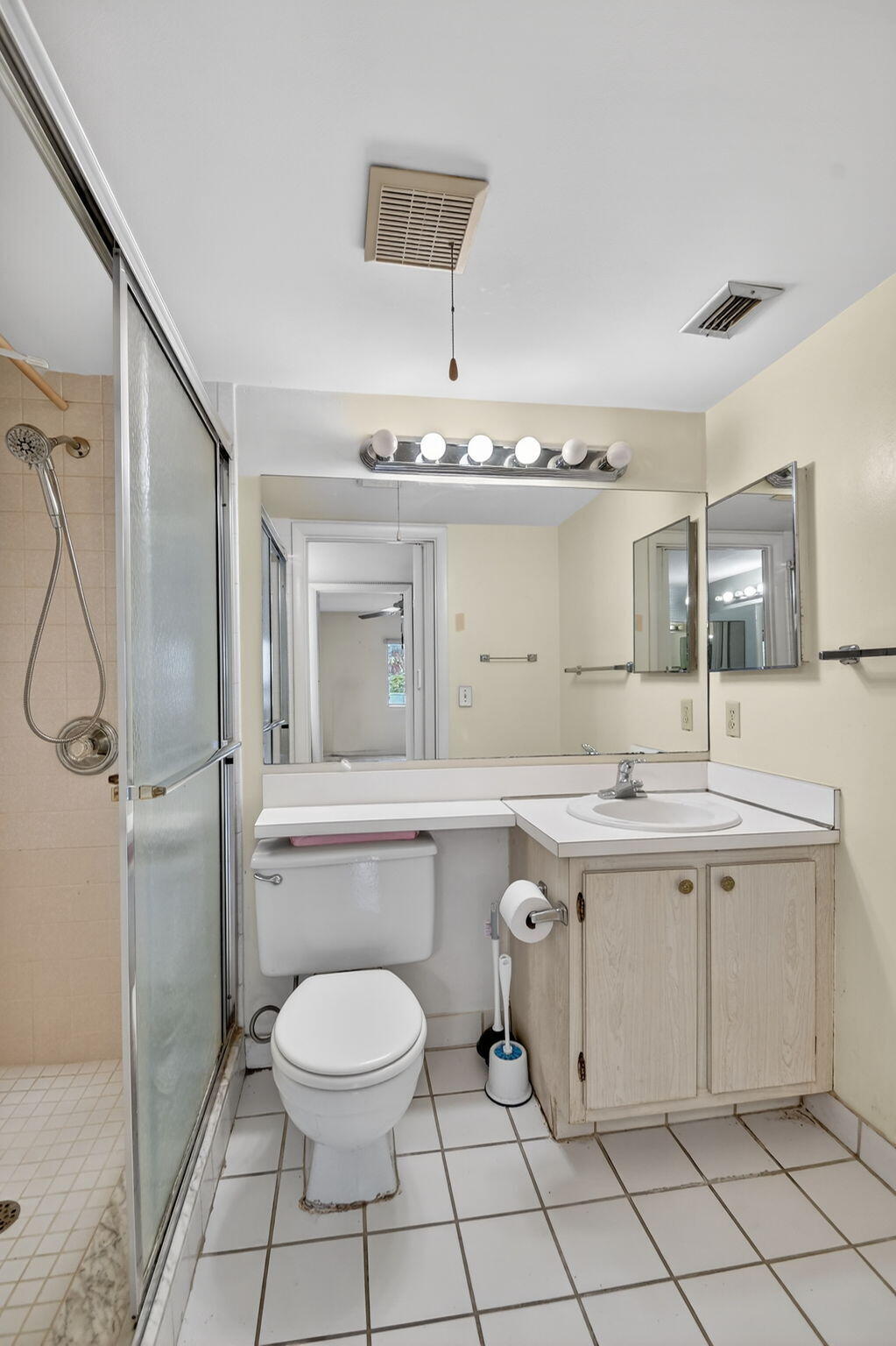 328 Pine Ridge Circle, Unit C1 Greenacres, FL 33463 - Photo 27 of 47 a spacious bathroom with a sink a toilet and shower