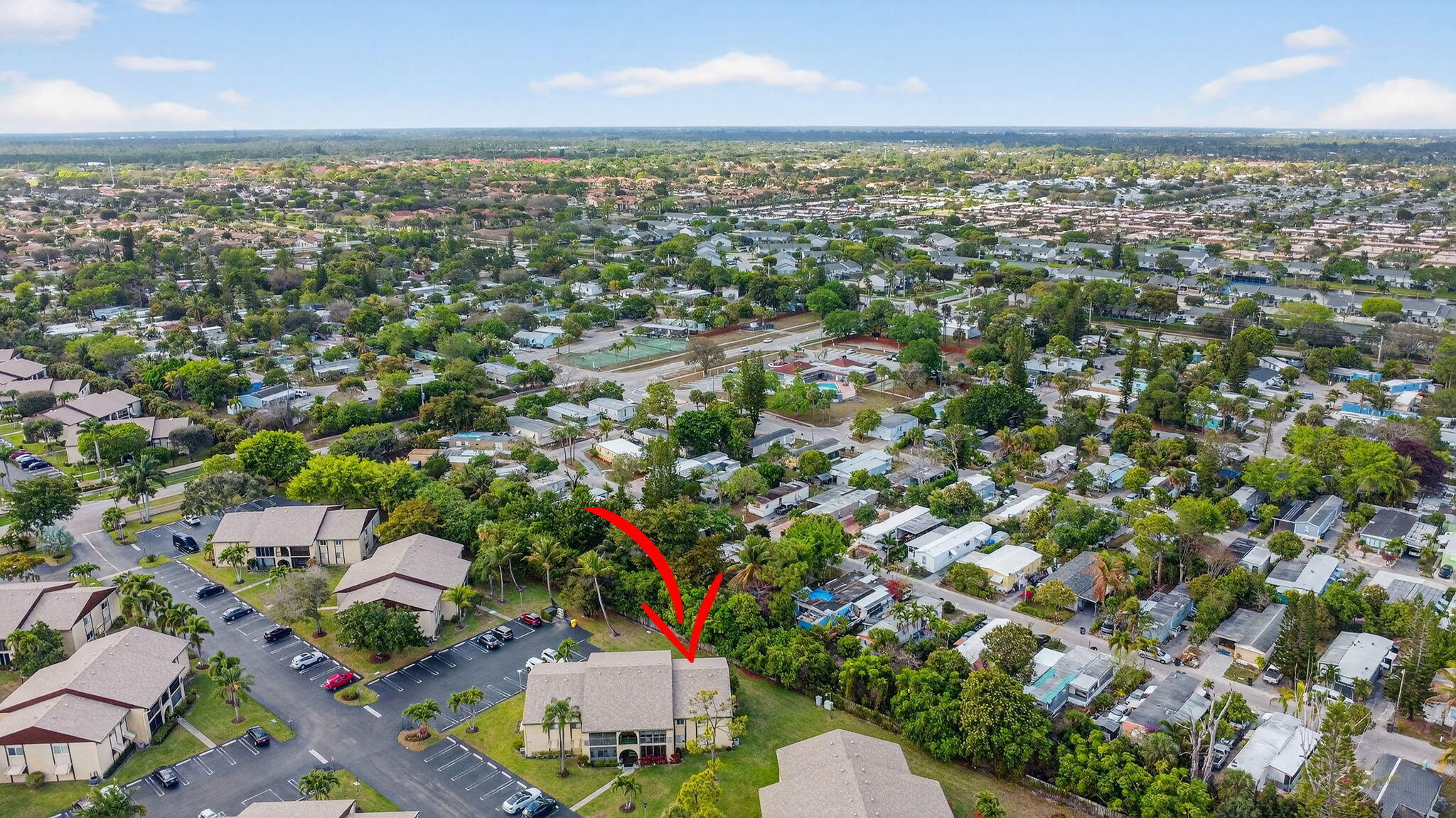 328 Pine Ridge Circle, Unit C1 Greenacres, FL 33463 - Photo 37 of 47 an aerial view of residential houses with outdoor space