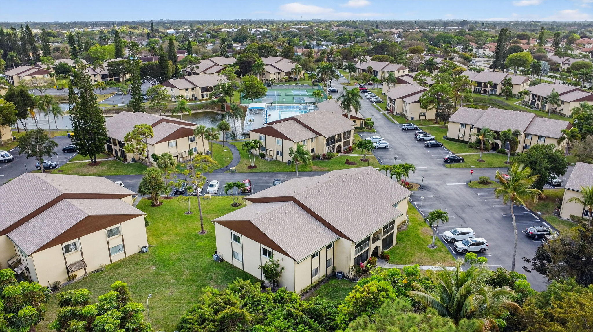 328 Pine Ridge Circle, Unit C1 Greenacres, FL 33463 - Photo 41 of 47 an aerial view of residential houses with outdoor space and street view