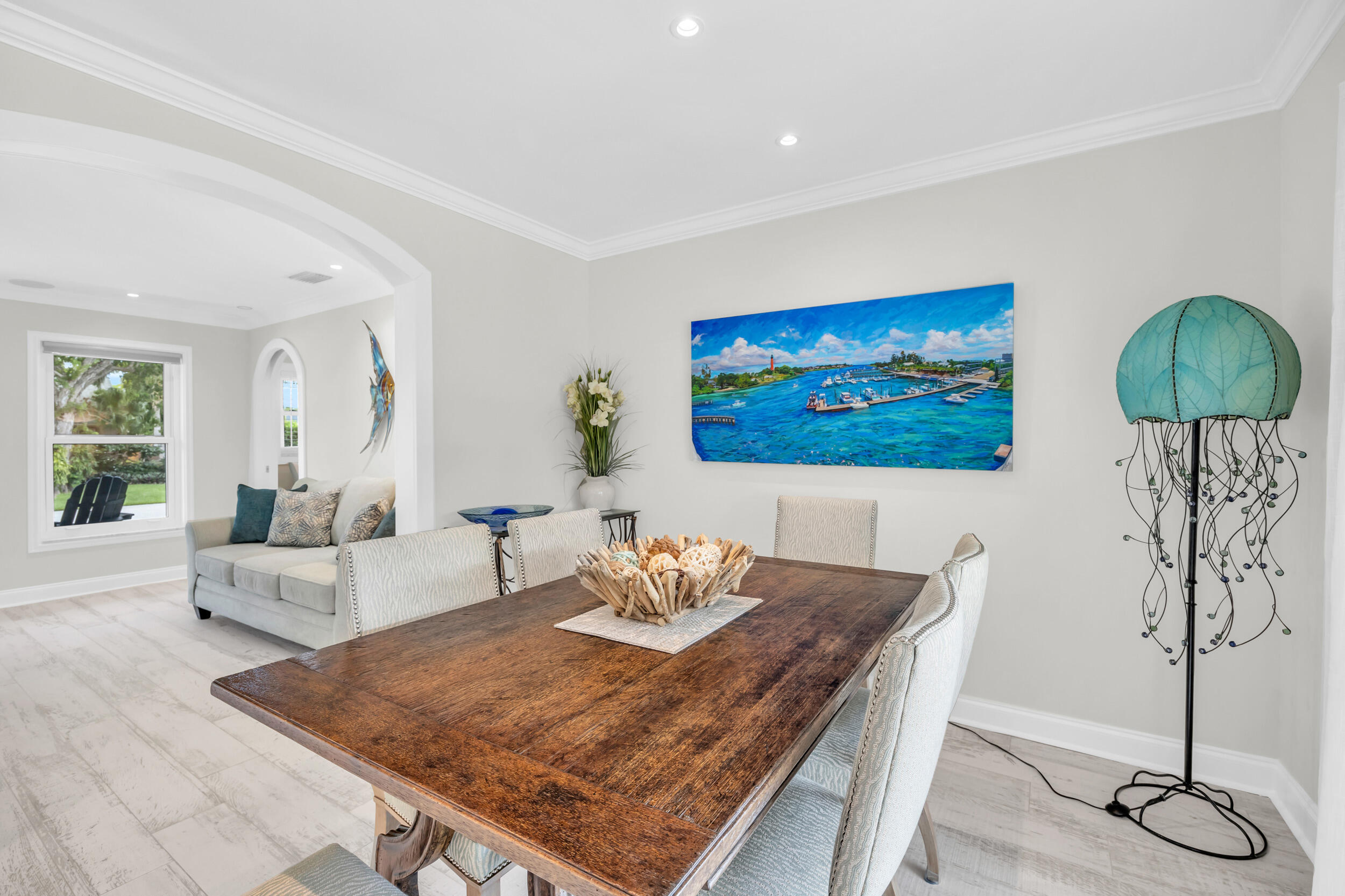11 Southeast Splitrail Circle Jupiter, FL 33469 - Photo 13 of 48 a living room with furniture and a table