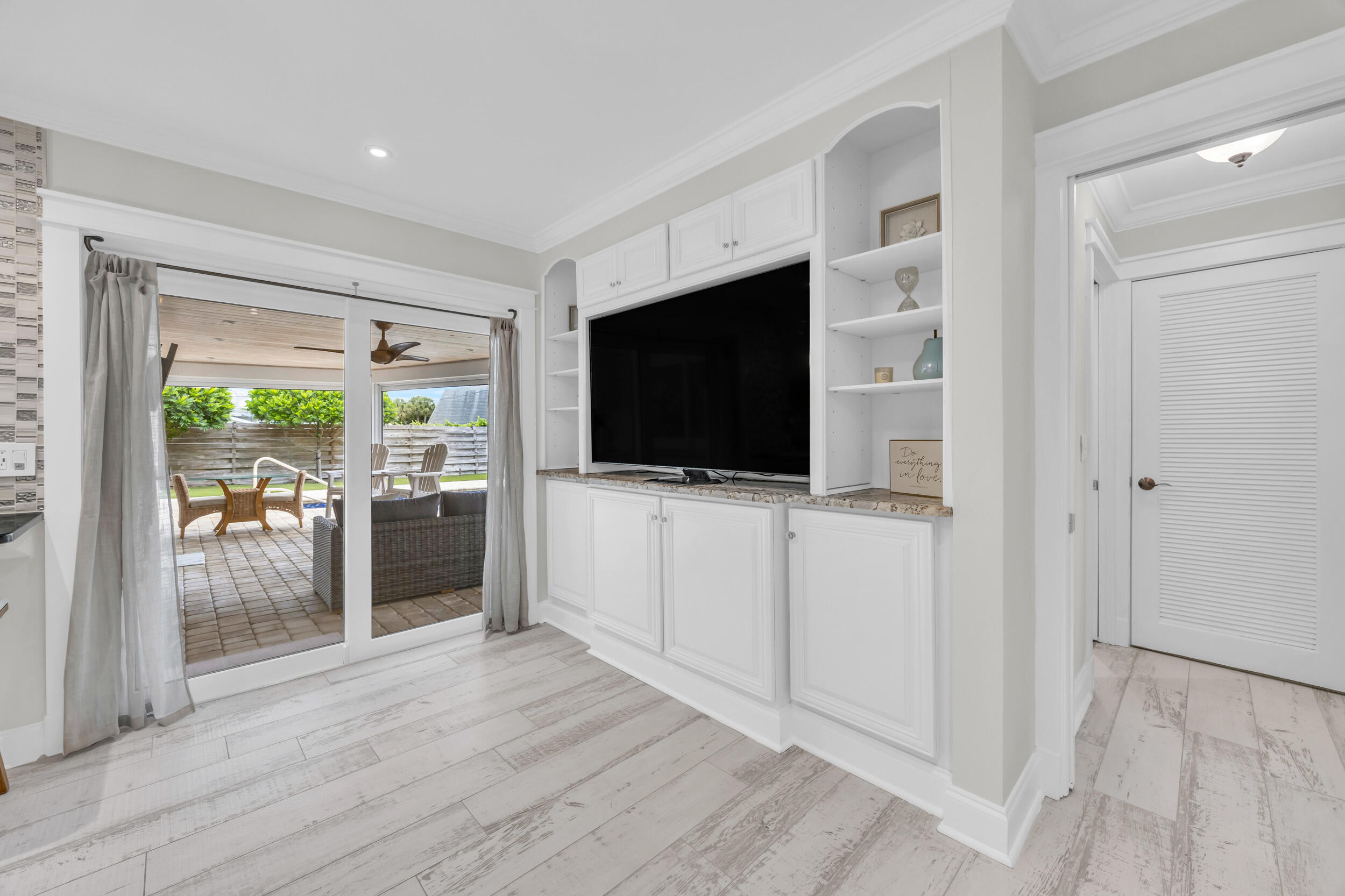 11 Southeast Splitrail Circle Jupiter, FL 33469 - Photo 20 of 48 a room with furniture and a flat screen tv